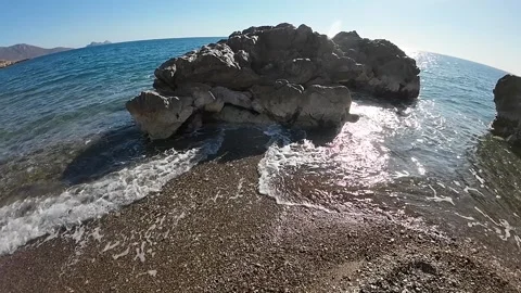 Waves are lapping at the beach Stock Footage 299902381