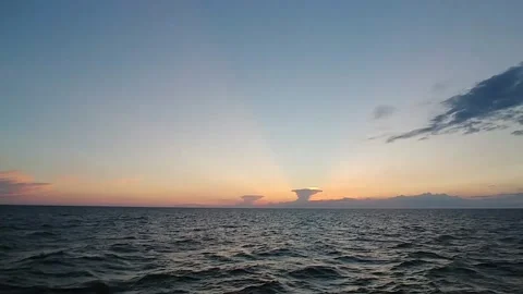 Waves are swashing at the sunset Stock Footage 138312368