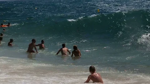Waves are on yellow sand beach of Costa Brava in Catalonia, Spain Stock Footage 78987797