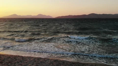 Waves areal tilt at sunset Stock Footage 138075583