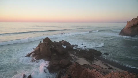 Waves Around Sea Stack at Santa Cruz Portugal Stock Footage 346528397