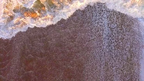 Waves arrive on the coast of Namibia. Stock Footage 77506759