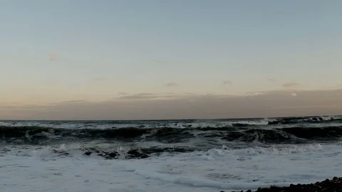 Waves arriving on a pebble beach Stock Footage 72789741