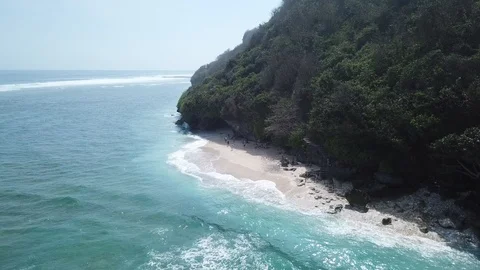 Waves Arriving on Small Secluded Beach [Drone Footage] Stock Footage 96236968