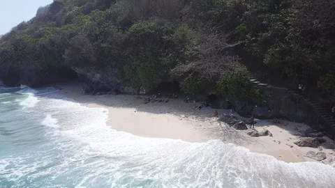 Waves Arriving on Small Secluded Beach [Drone Footage] Stock Footage 96237022
