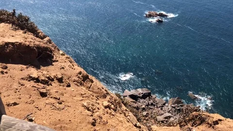 Waves of the Atlantic Ocean and lighthouse in Cabo da Roca, Portugal. Stock Footage 118087222