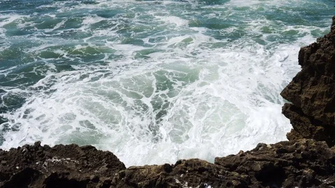 Waves of the Atlantic Ocean breaking on the rocks of the Portuguese coast. Stock Footage 96395188