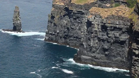 Waves of the Atlantic Ocean at the  Cliffs of Moher, Ireland Stock Footage 130896823