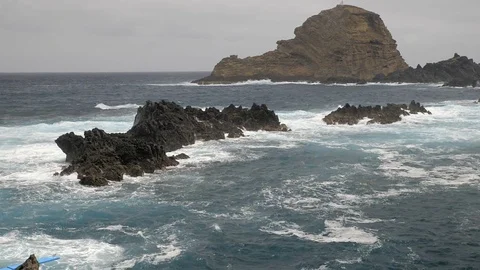 Waves of the atlantic ocean hit rocks on the coast of Madeira Island Stock Footage 79945661