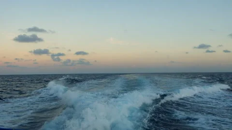 Waves from the back of a boat Stock Footage 45879108
