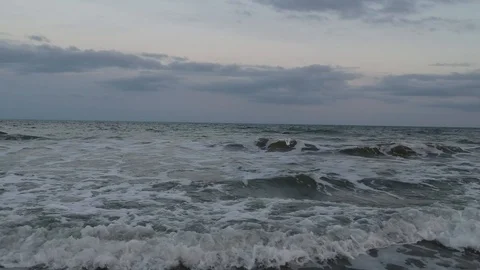 Waves Backwards-Flying Drone Shot at Beach Stock Footage 106761897