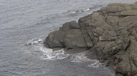 Waves banging into a cliff Stock Footage 48596180