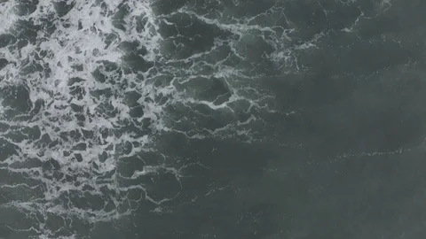 Waves on the beach in Bali Island 4K Drone flight Stock Footage 119343474