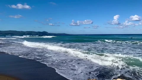 Waves at the beach. The beach with close up the sand. Blur high wave. Travel sum Stock Footage 226137362