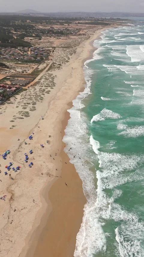 Waves on the beach in Chile by aerial view Stock Footage 274228494