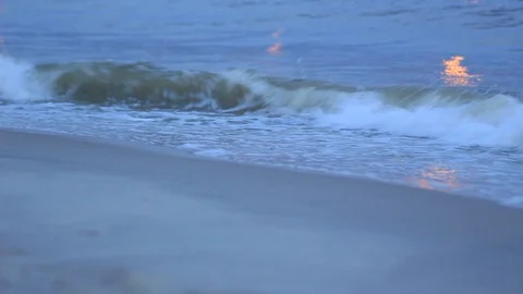 Waves on beach during dusk Stock Footage 92964866
