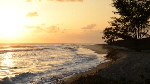 Waves on the beach during Hawaiian Sunset Stock Footage 104647704