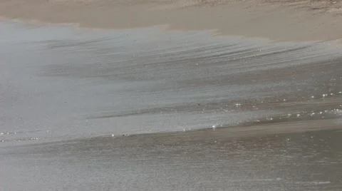 Waves on the Beach Stockbeeldmateriaal 6547270