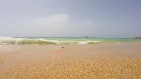 Waves on beach Stock Footage 80647763