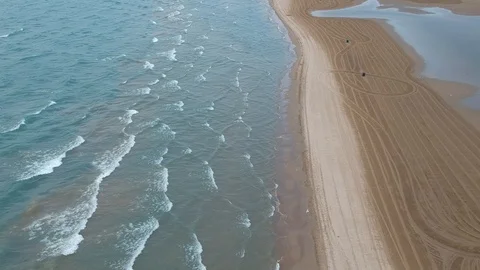 Waves on beach Stock Footage 89986545