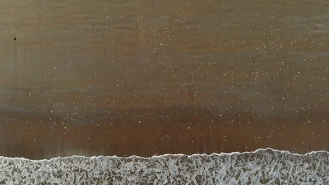 Waves at a beach Stock Footage 93584394