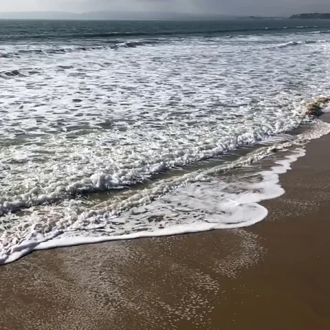 Waves on a beach Stock Footage 104458333