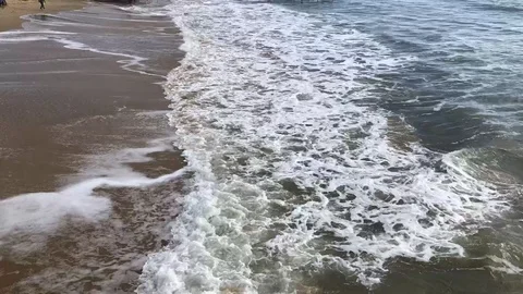 Waves on a beach Stock Footage 104559017