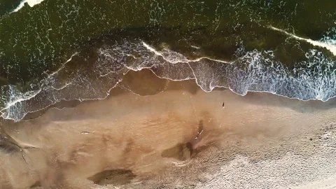 Waves on a beach Video stock 115317338