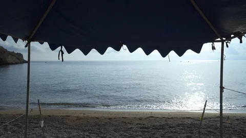 Waves on a beach Stock Footage 122736174