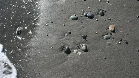 Waves on a beach Stock Footage 136667897