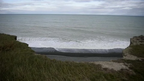 Waves on a beach Stock Footage 243421739