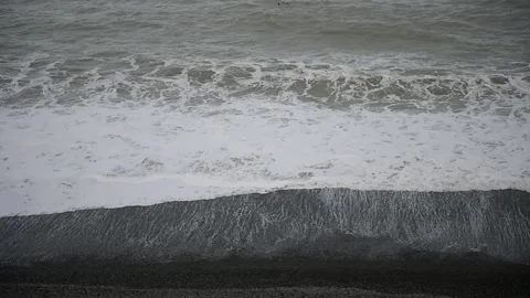 Waves on a beach Stock Footage 243421834