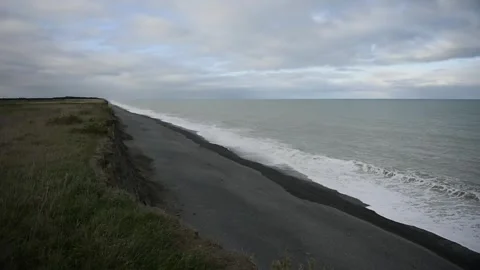 Waves on a beach Stock Footage 243422031