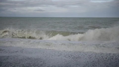 Waves on a beach Stock Footage 243422062