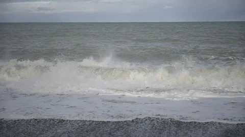 Waves on a beach Stock Footage 243422095