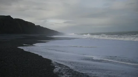 Waves on a beach Stock Footage 243422097