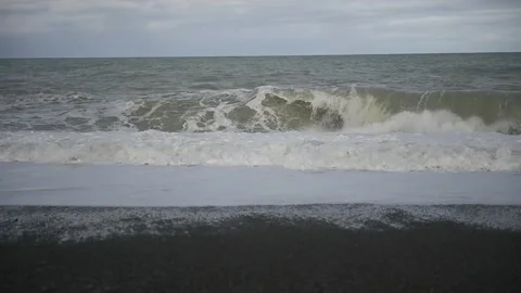 Waves on a beach Stock Footage 243422143
