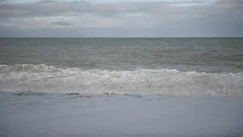 Waves on a beach Stock Footage 243422190