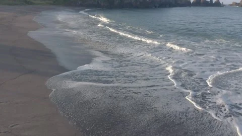 Waves on the beach full of sand Stock Footage 242505923