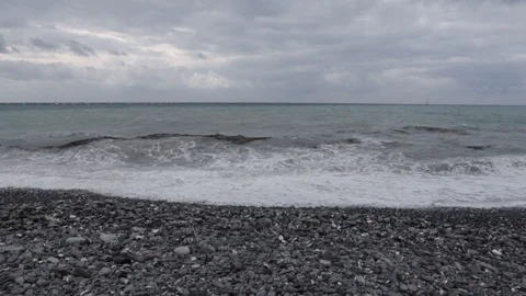 Waves on the beach in Genoa Stock Footage 103054100