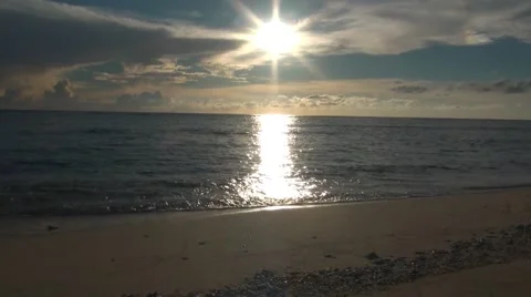 Waves on a beach in the late afternoon Stock Footage 44395828
