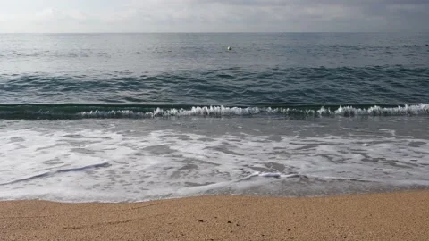 Waves on the beach in the morning Stock Footage 132124354