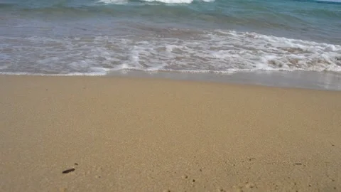Waves on the beach. Ocean waves on the sandy beach. Stock Footage 226402213