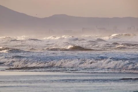 Waves on the beach of Oliva Stock Photos