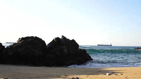 Waves beach Pacific coast barge (Vina del Mar, Chile) Stock Footage 130690313