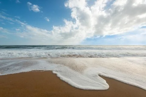 Waves on the beach Stock Photos