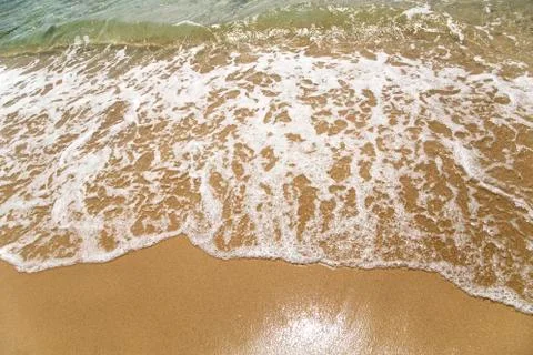 Waves on a beach Фото