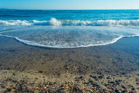 Waves on the beach Stock Photos