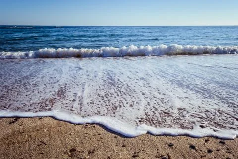 Waves on the beach Stock Photos