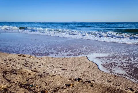 Waves on the beach Stock Photos